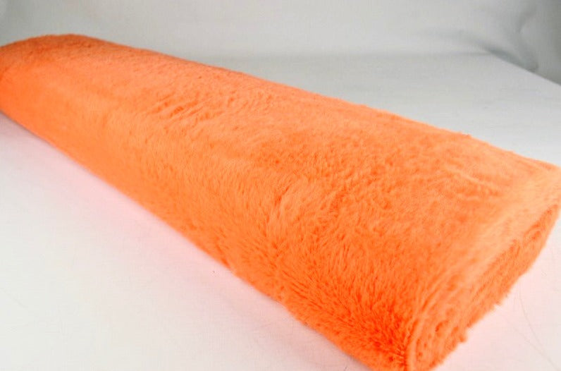 ORANGE PLYSCHTYG MED STRETCH OCH KORT LUGG