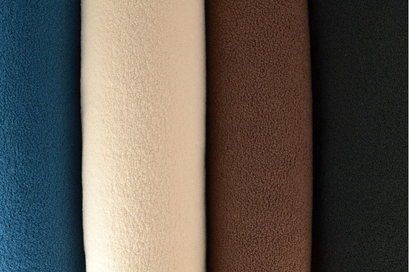 MÖRK PETROLEUMSBLÅ TEDDY TYG MED STRETCH