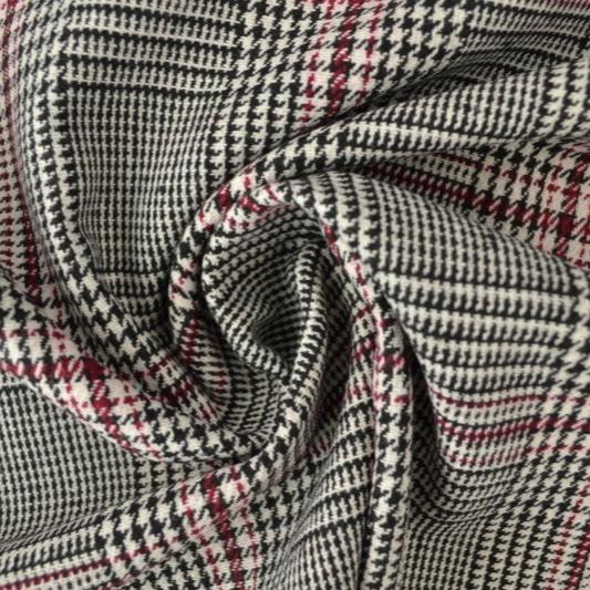 SVART, VIT OCH RÖD ULLTYG MED TWEEDSTRUKTUR MED HOUNDSTOOTH RUTOR