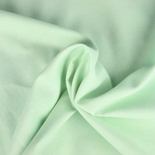 LJUS MINT BOMULLSPOPLIN – TÄTT VÄVT BOMULLSTYG