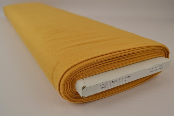 SENAPSGUL VISCOSE JERSEY TYG MED STRETCH