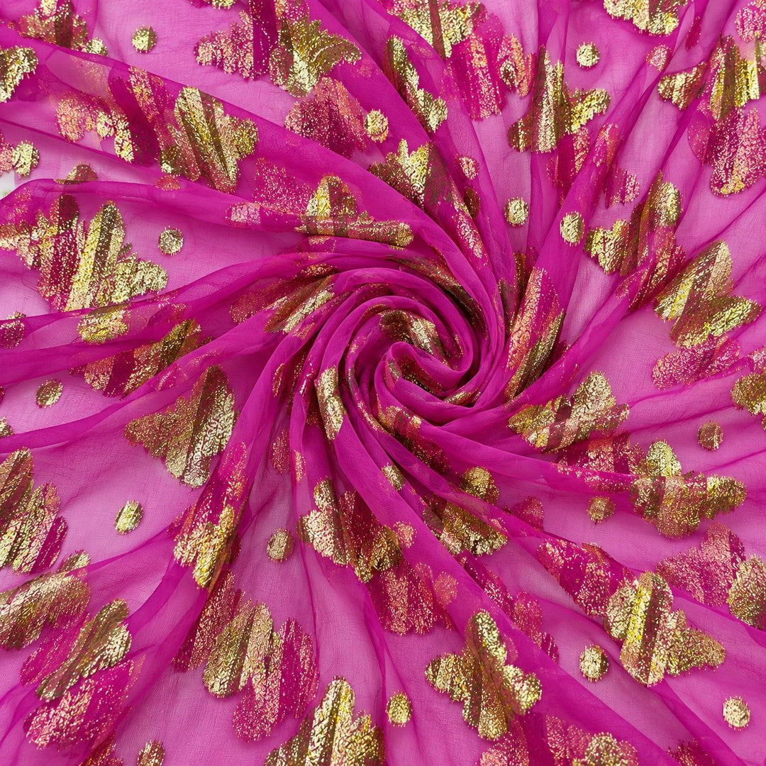 Pink lurexchiffong med gyllene fjärilsmotiv – tyget format som en spiral (bild 1 av 3)