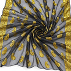 SVART LUREX CHIFFONSILK MED GYLLENE PAISLEYMÖNSTER OCH GULDBORTER