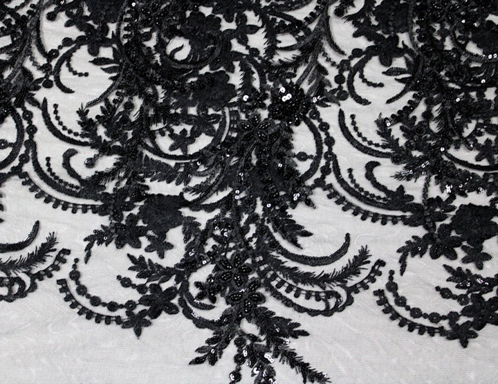 SVART TYLLTYG MED PALJETTER OCH PÄRLOR