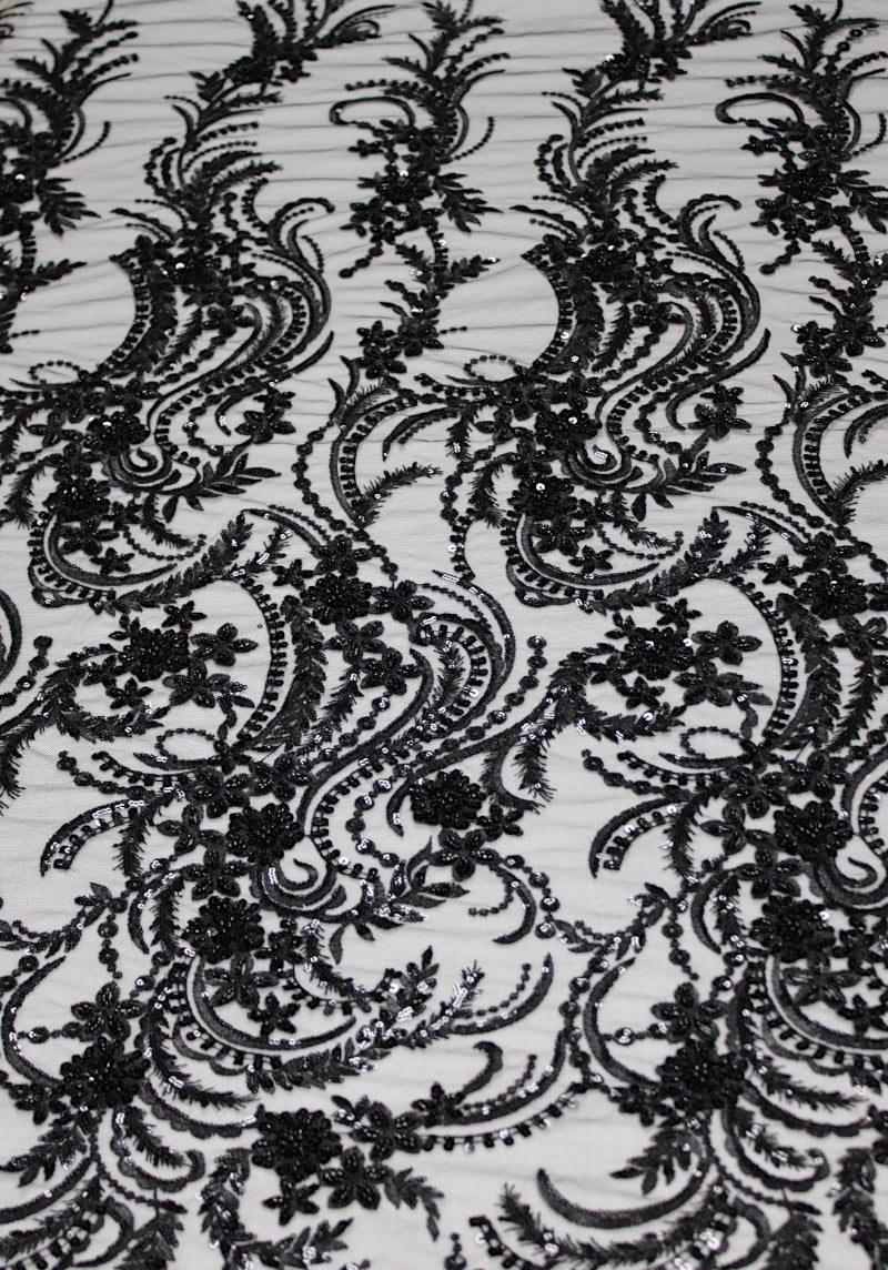 SVART TYLLTYG MED PALJETTER OCH PÄRLOR