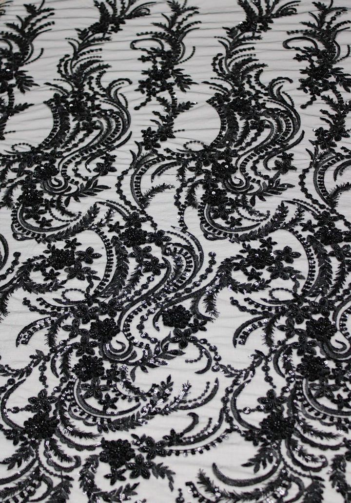 SVART TYLLTYG MED PALJETTER OCH PÄRLOR