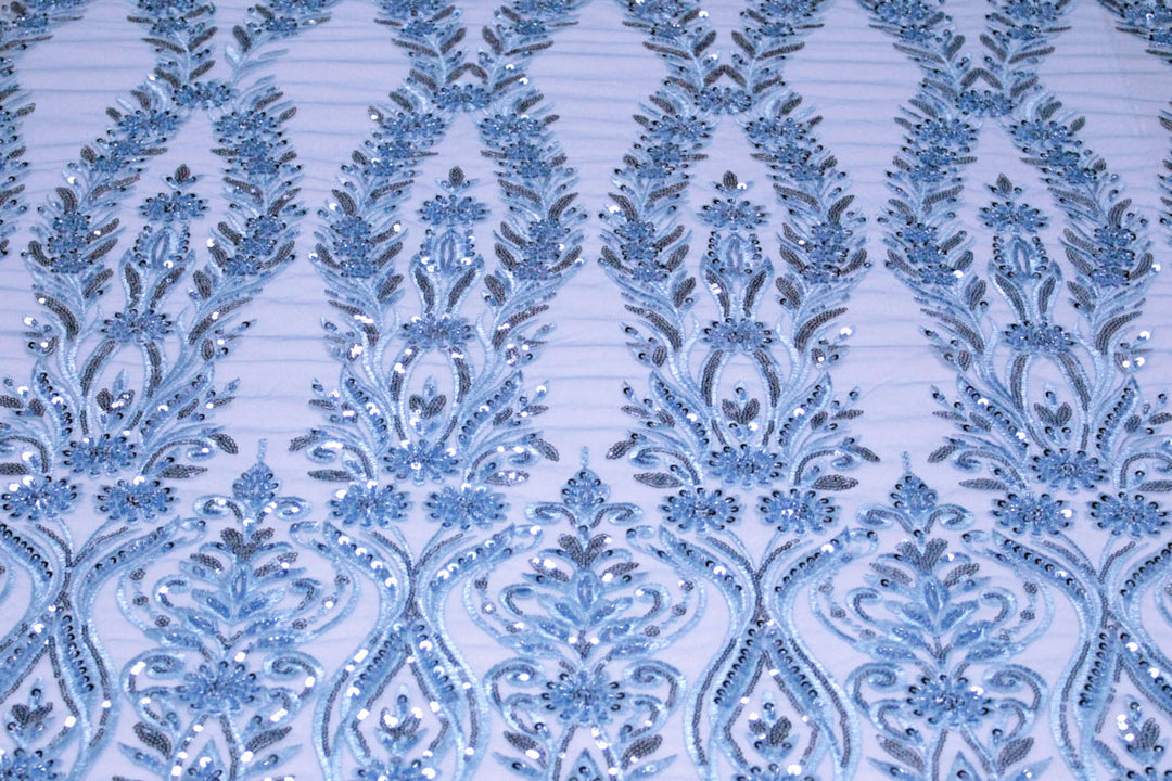 BLÅTT TYLLTYG MED PALJETTER OCH PÄRLOR