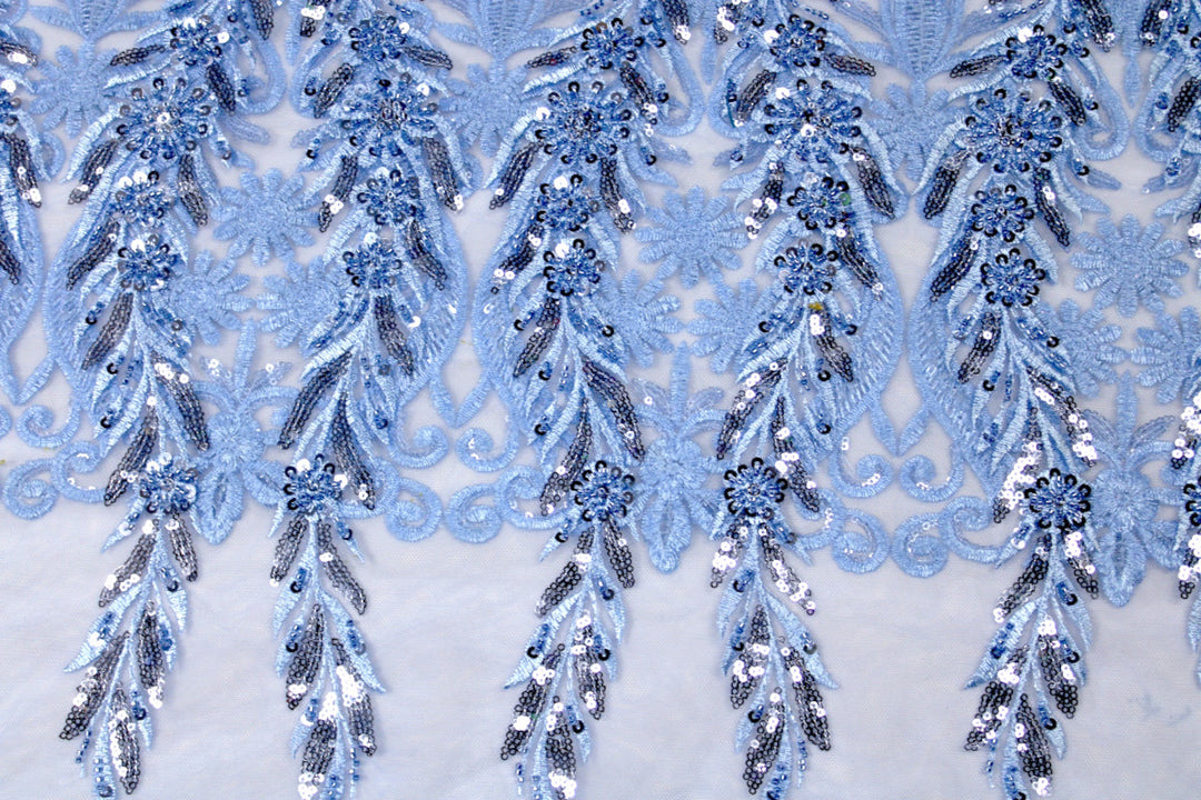 BLÅTT TYLLTYG MED PALJETTER OCH PÄRLOR