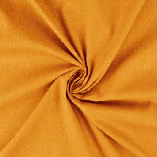 SENAPSGUL BOMULLSPOPLIN – TÄTT VÄVT BOMULLSTYG