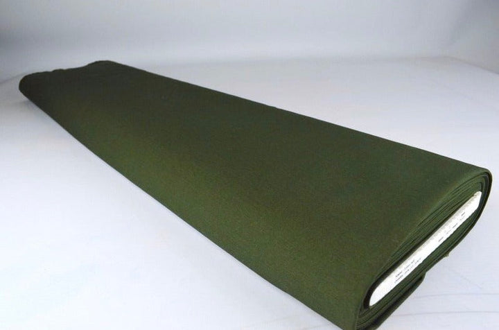 MÖRK MOSGRÖN BOMULLSTWILL – KRAFTIGT OCH FORMSTABILT TYG