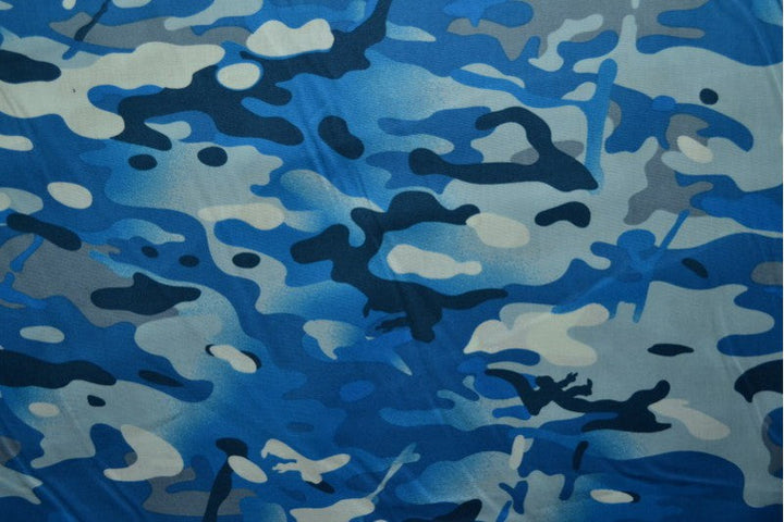 BLÅ BOMULDSPOPLIN MED CAMOUFLAGE PRINT