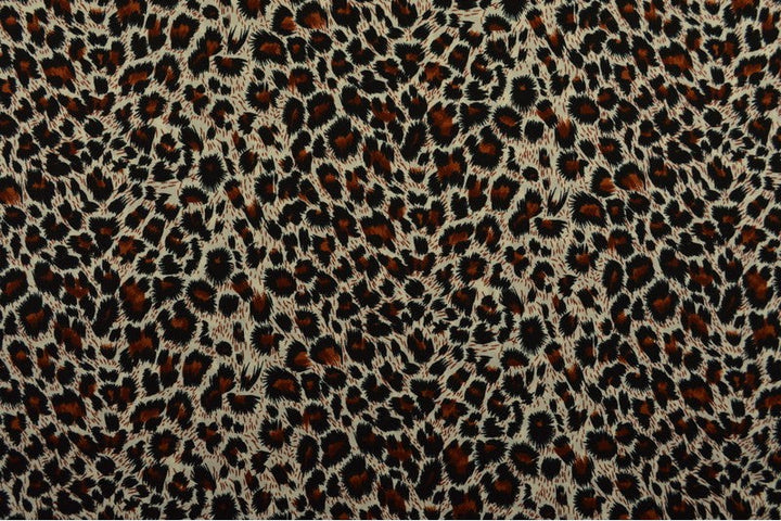 CREME BOMULDSPOPLIN MED LEOPARDPRINT – SORT & BRUN
