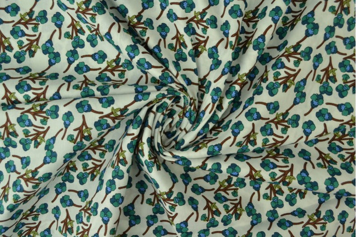HVID BOMULDSPOPLIN MED BOTANISK BLOMSTERPRINT – TEAL & BRUN