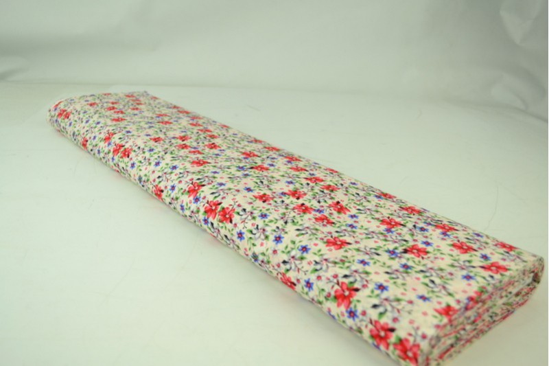 CREME BOMULDSPOPLIN MED MULTIFARVET DITSY BLOMSTERPRINT