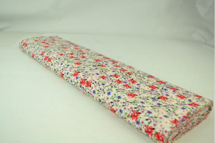 CREME BOMULDSPOPLIN MED MULTIFARVET DITSY BLOMSTERPRINT