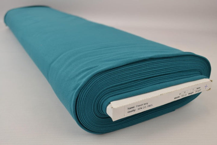 MÖRK PETROLEUMSBLÅ FRENCH TERRY – MJUK BOMULLSSTICKAD METERVARA MED STRETCH