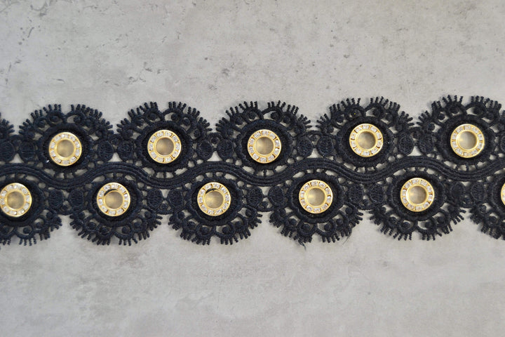 SVART BLOMSTERBAND MED GULDRINGAR 55MM