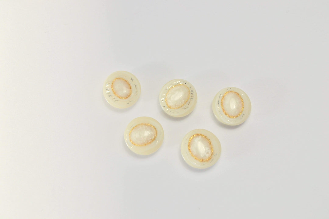 CREMEFÄRGAD KNAPPAR MED GLITTRANDE GOUD 5 ST.