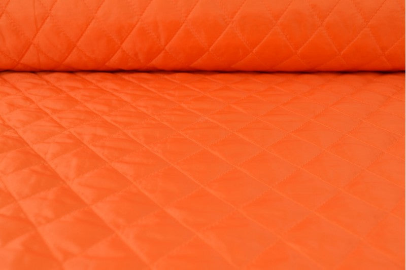 ORANGE QUILTAT TYG MED VADDERAD BAKSIDA