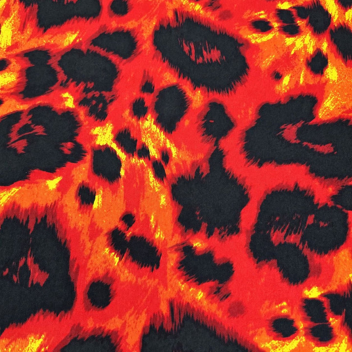 Röd och orange siden med leopardtryck – närbild av mönstret (bild 1 av 3)