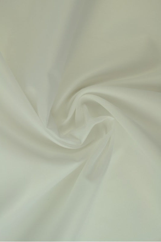 VIT LÄTT VATTENTÄT POLYESTER – SLITSTARK & SNABBTORKANDE