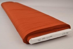 KOPPARFÄRGAD BOMULLSPOPLIN – TÄTT VÄVT BOMULLSTYG