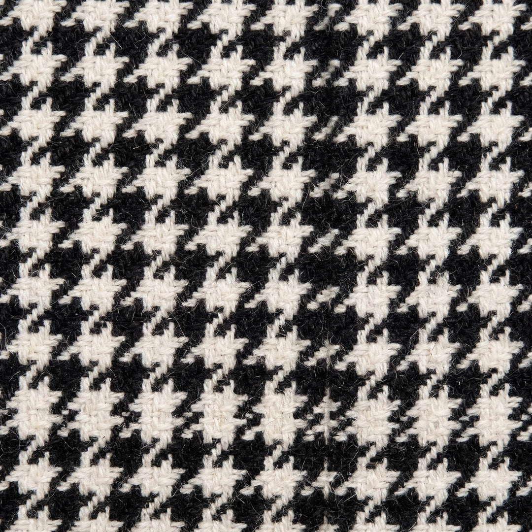 SORT OCH VIT ULL/POLYESTER TYG MED TWEEDSTRUKTUR MED HOUNDSTOOTH-TERN