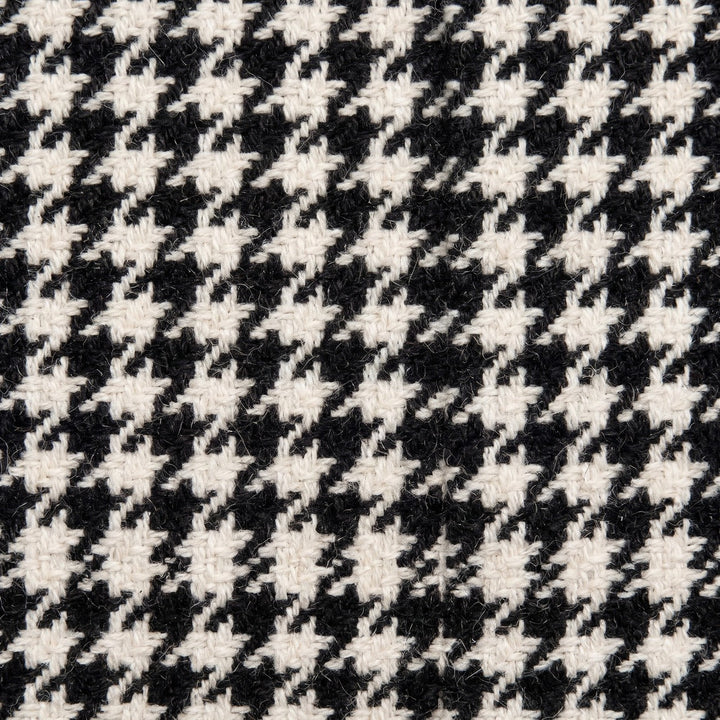 SORT OCH VIT ULL/POLYESTER TYG MED TWEEDSTRUKTUR MED HOUNDSTOOTH-TERN