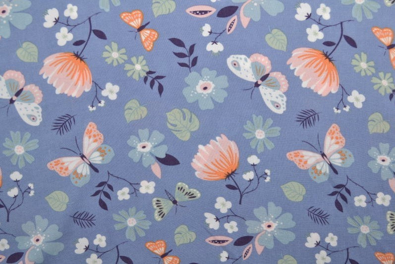 BLÅTT VISCOSETYG MED BLOMMOR OCH SOMMARFJÄRIL TRYCK