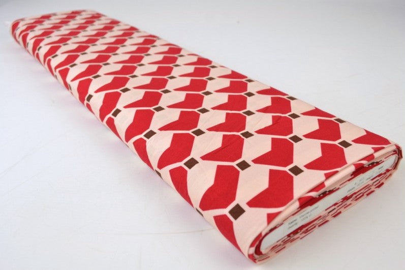 RÅVITT VISCOSETYG MED RÖD GEOMETRISK TRYCK