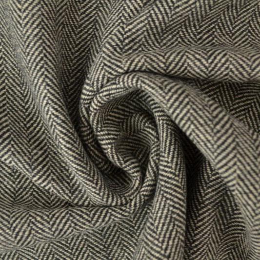 BEIGE YLLETYG MED TWEEDSTRUKTUR OCH SILLBENSMÖNSTER