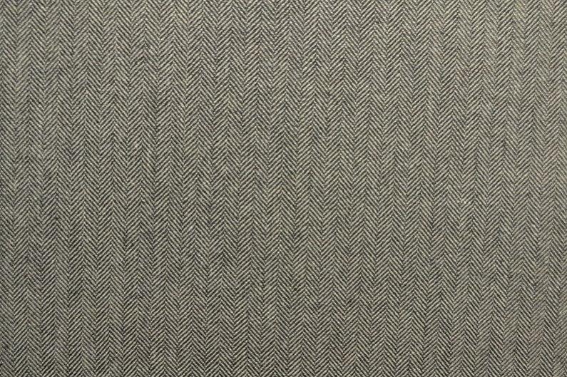 BEIGE YLLETYG MED TWEEDSTRUKTUR OCH SILLBENSMÖNSTER