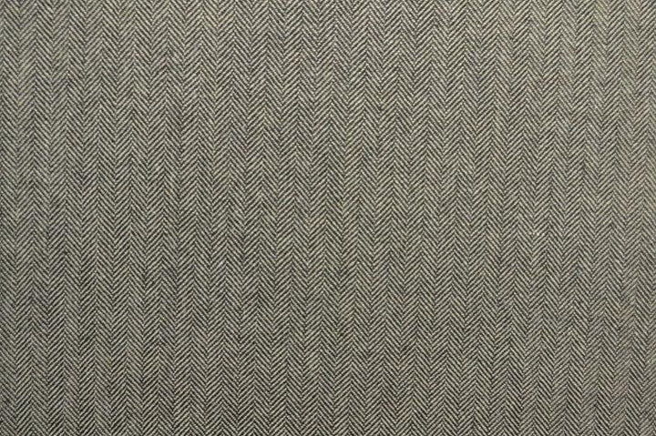 BEIGE YLLETYG MED TWEEDSTRUKTUR OCH SILLBENSMÖNSTER