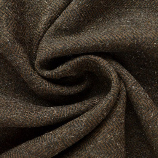 BRUN YLLETYG MED TWEEDSTRUKTUR OCH SILLBENSMÖNSTER