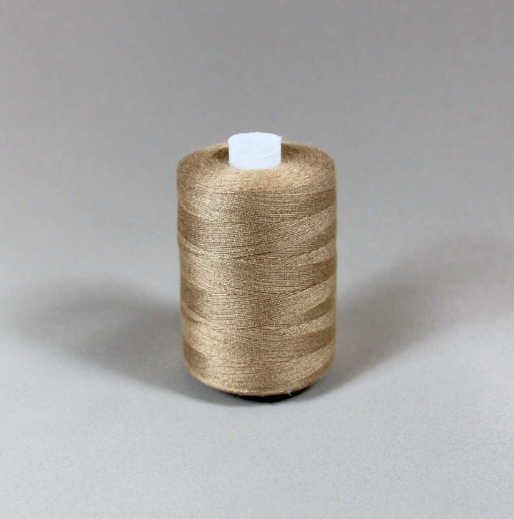 BEIGE STARK POLYESTER SYTRÅD