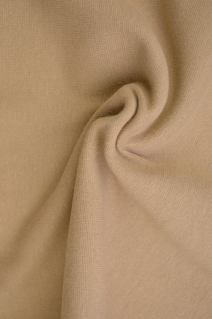 BEIGE RUNDSTICKAD MUDDVÄV MED STRETCH